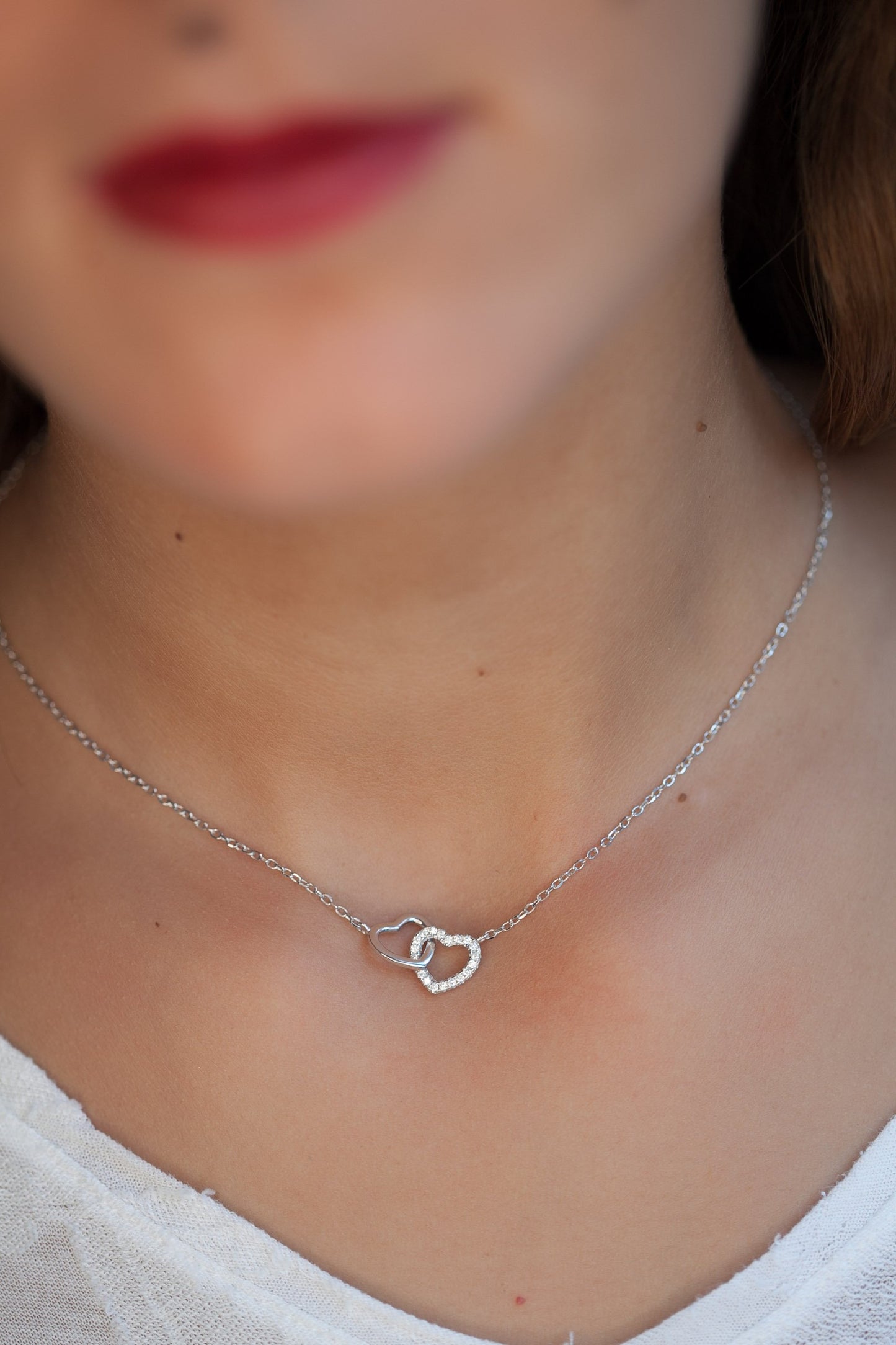Halskette zwei Herzen aus Silber mit Zirkonia