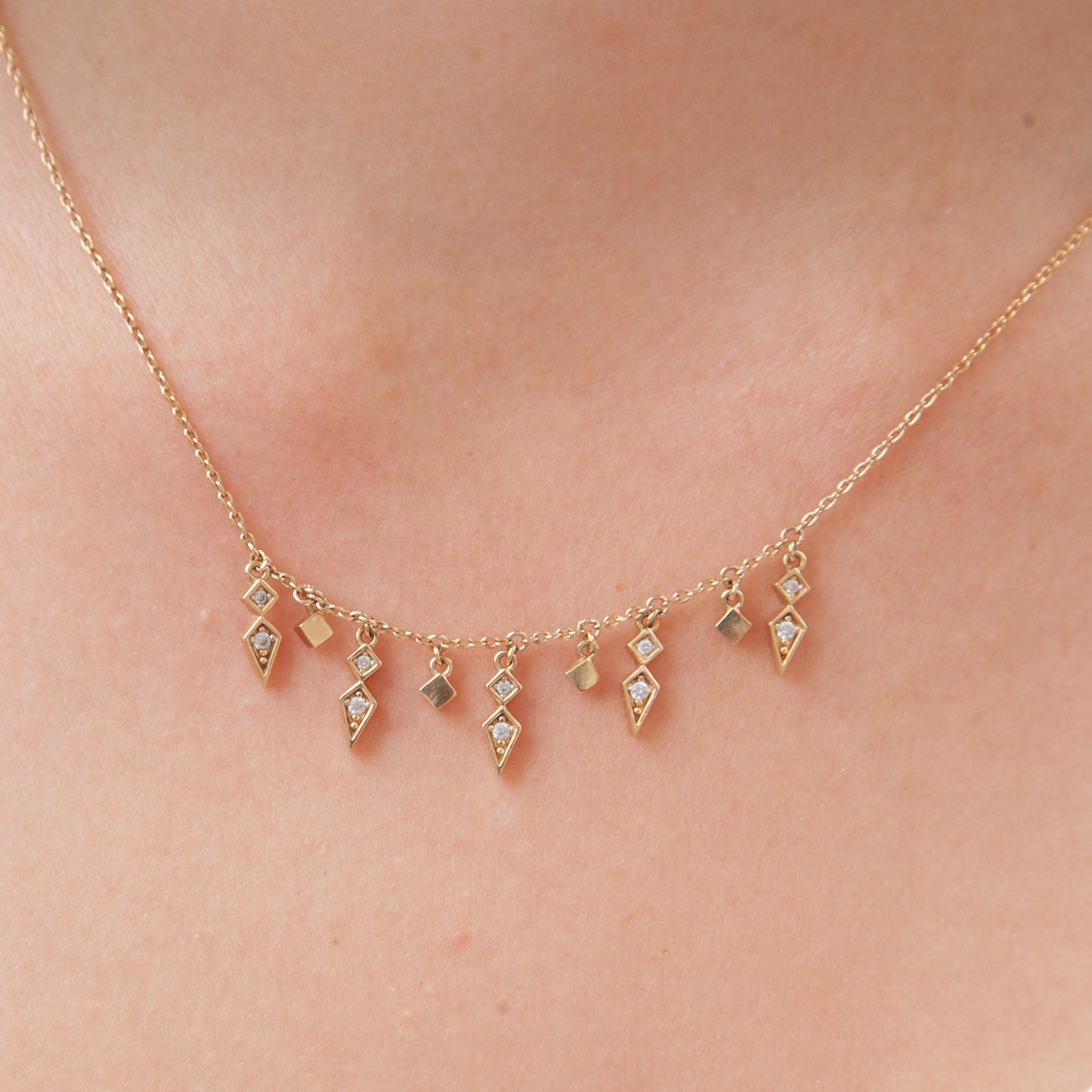 Halskette mit verschiedenen Anhängern - 18K vergoldet