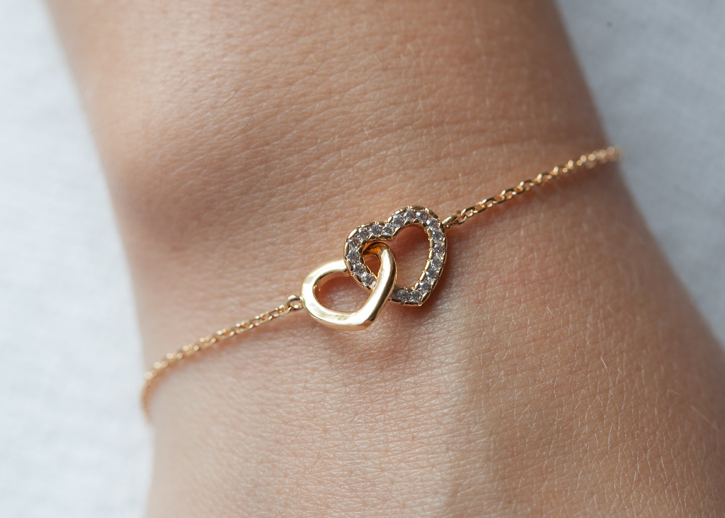 Armband zwei Herzen mit Zirkonia vergoldet