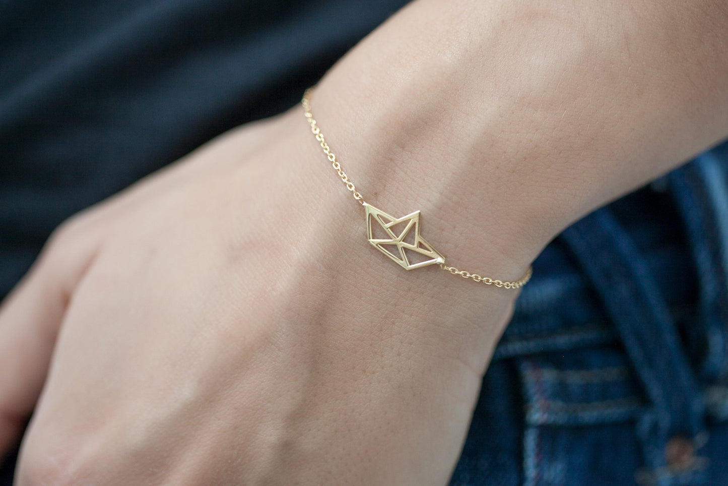 Armband mit Origami Papierschiff - 16 Karat vergoldet
