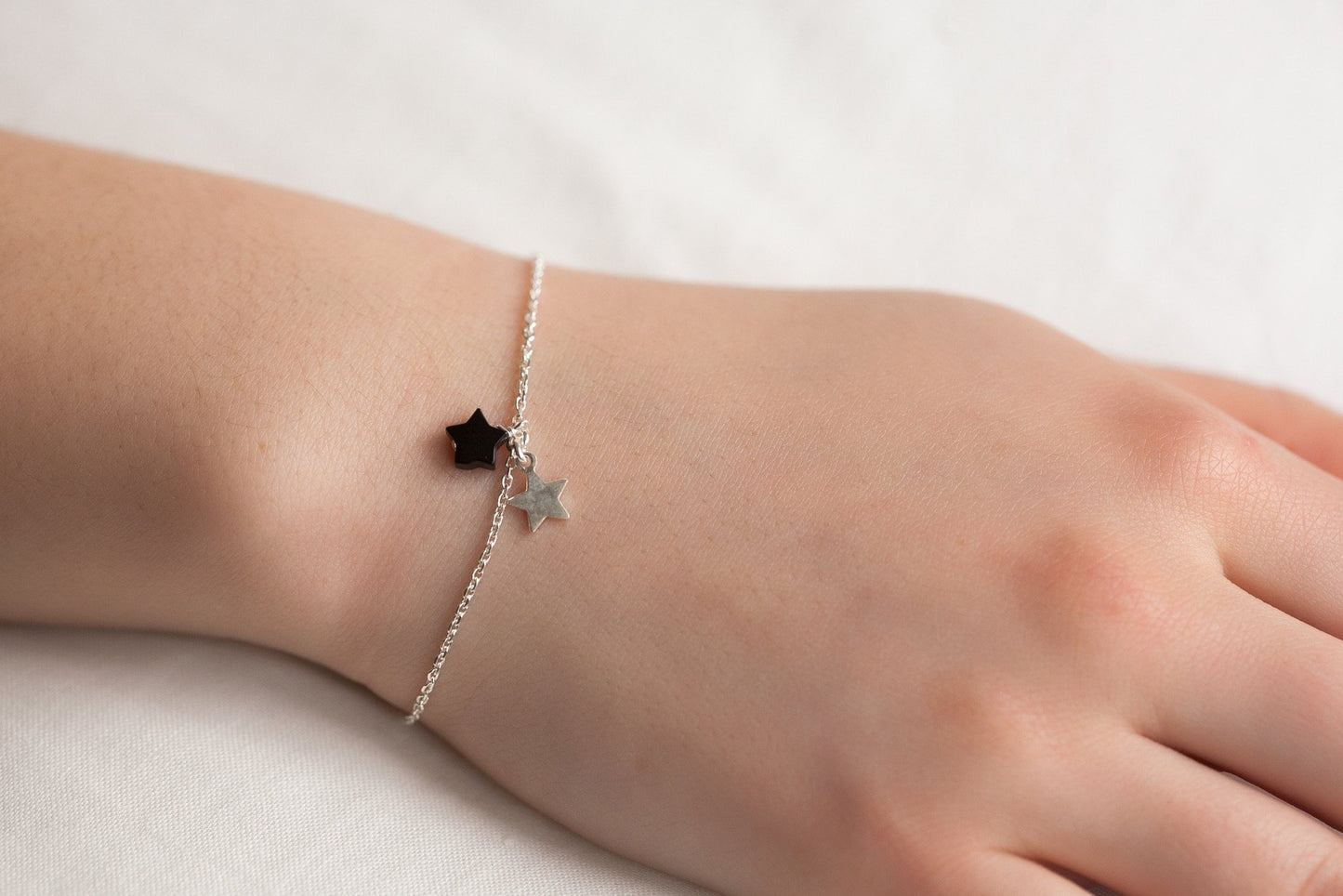 Armkette mit 2 kleinen Sternchen aus Silber
