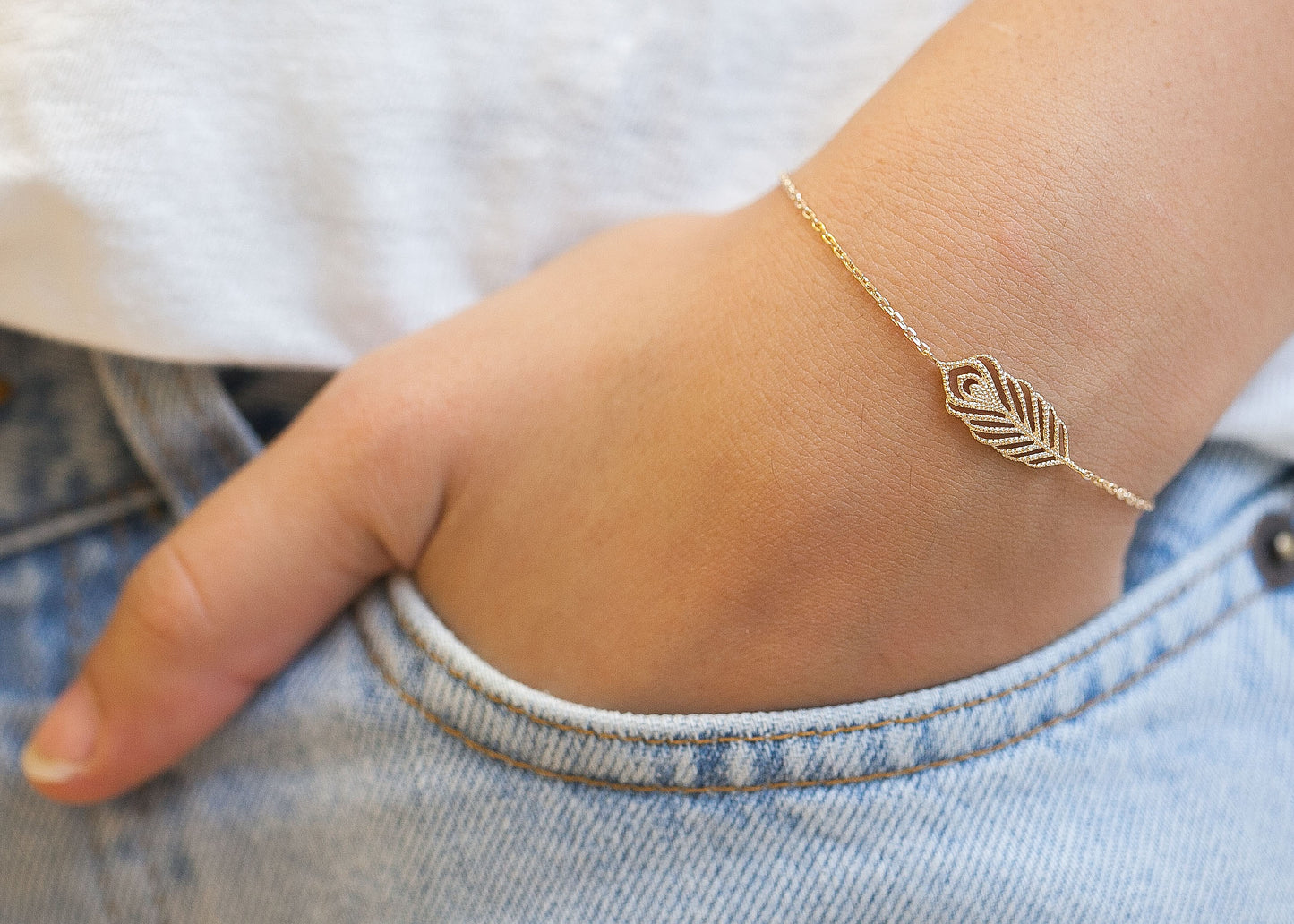 Armband mit Feder vergoldet