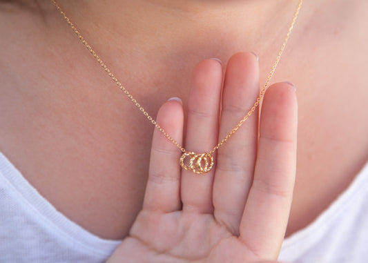 Kette mit 3 Ringen als Anhänger vergoldet