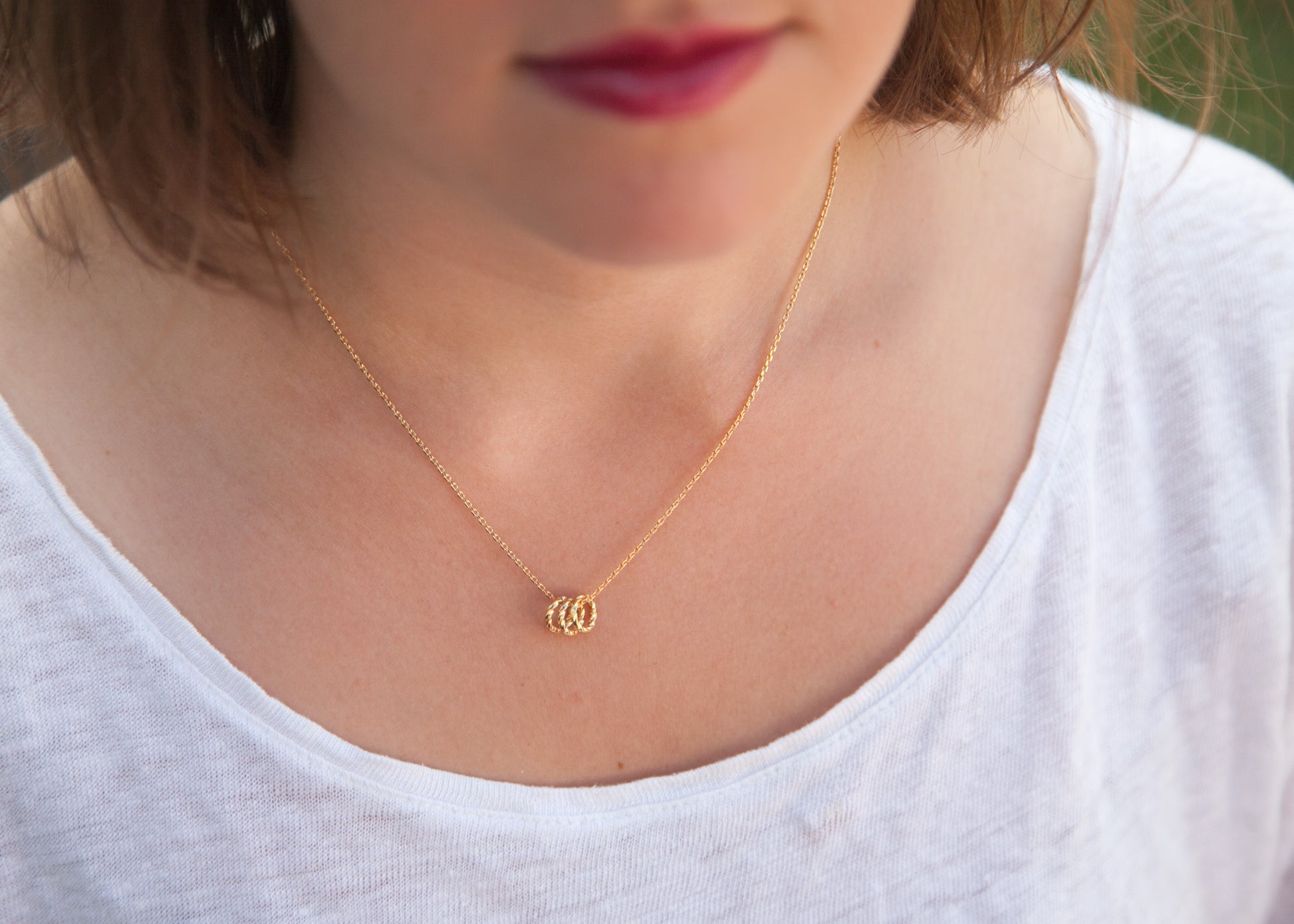 Kette mit 3 Ringen als Anhänger vergoldet