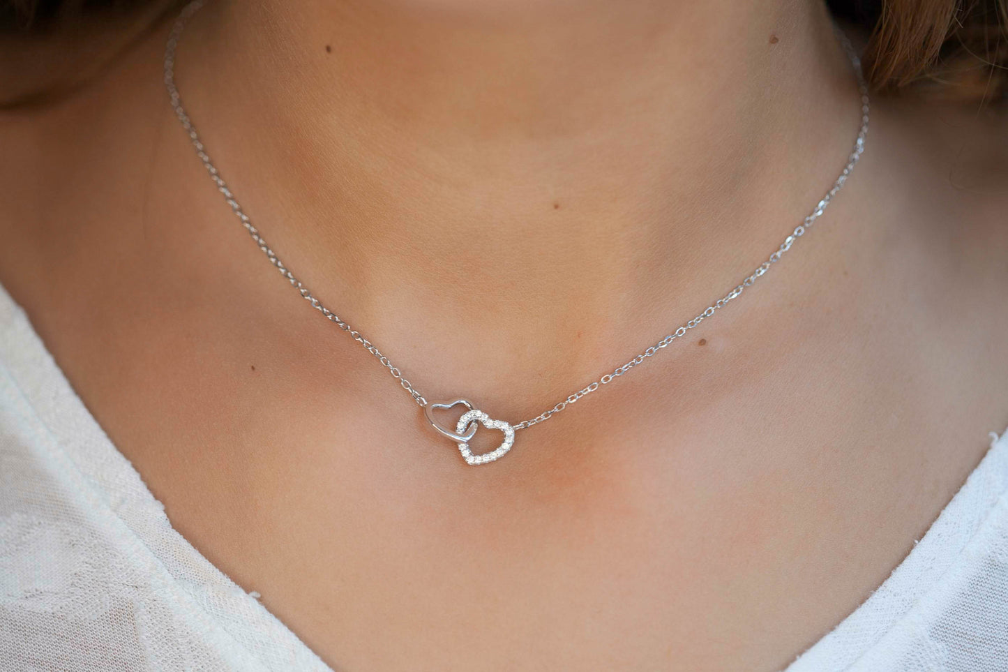 Halskette zwei Herzen aus Silber mit Zirkonia