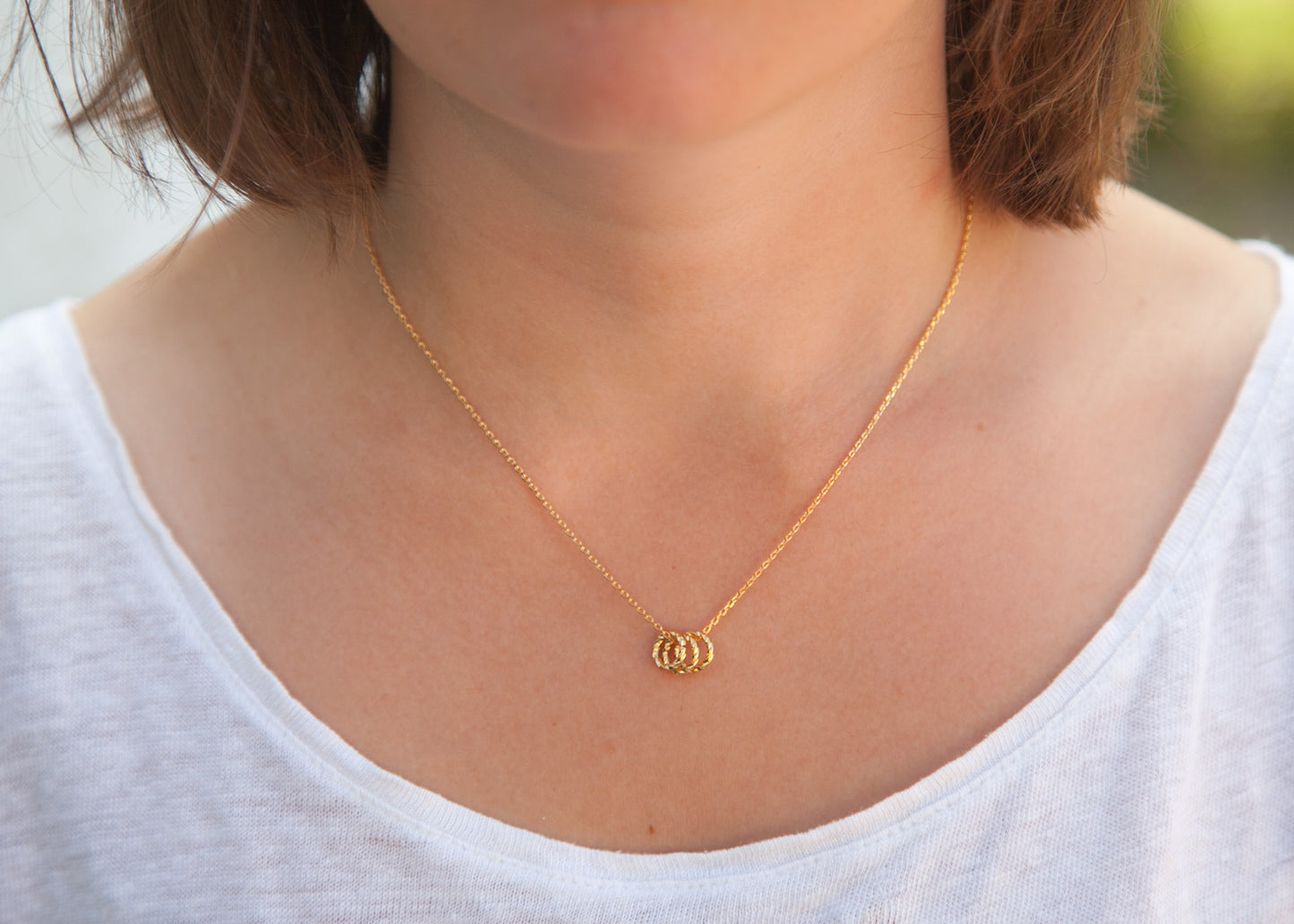 Kette mit 3 Ringen als Anhänger vergoldet