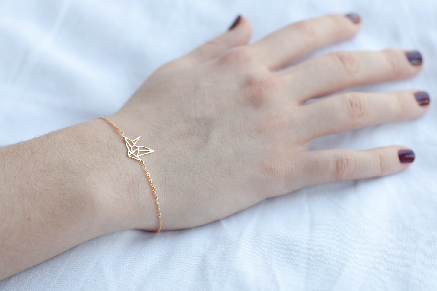 Armband mit Origami-Vogel, vergoldet