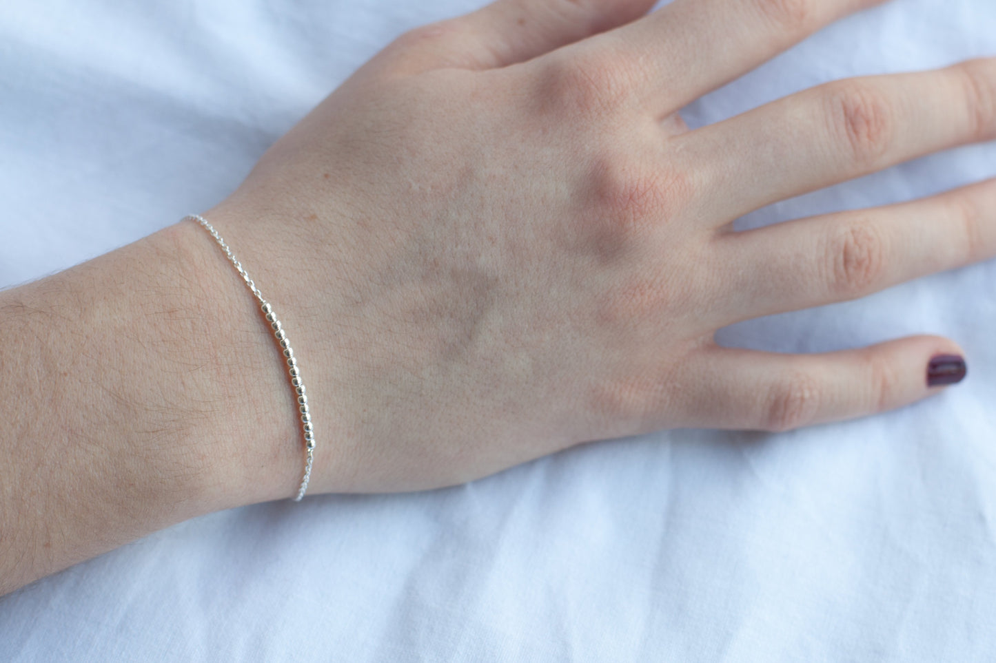 Armband mit 16 Perlen aus Silber