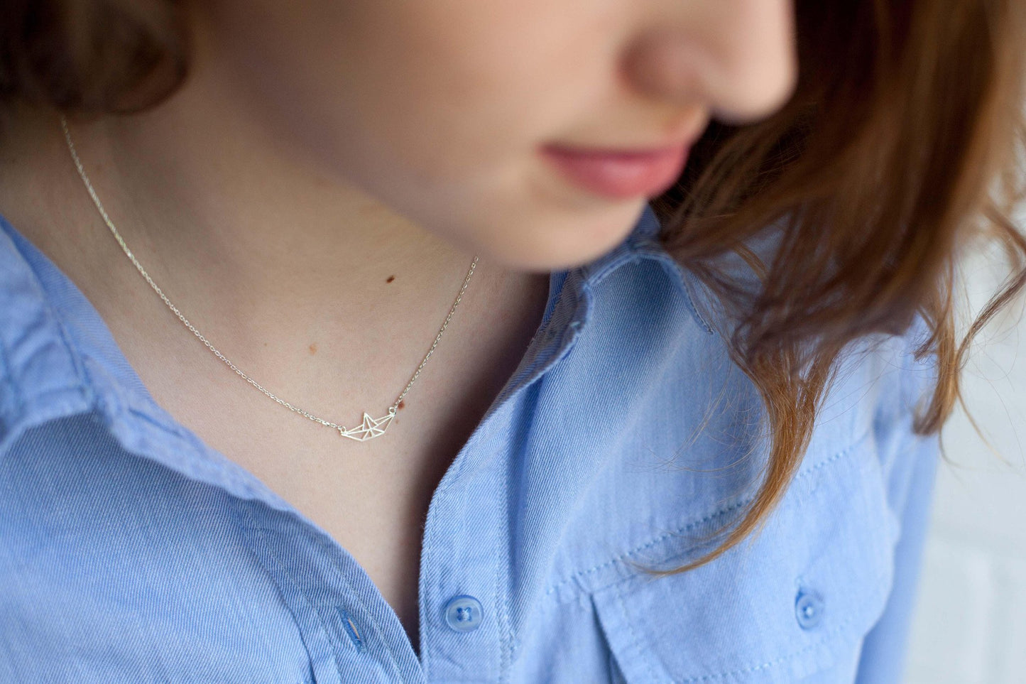 Kette mit Origami Papierschiff versilbert