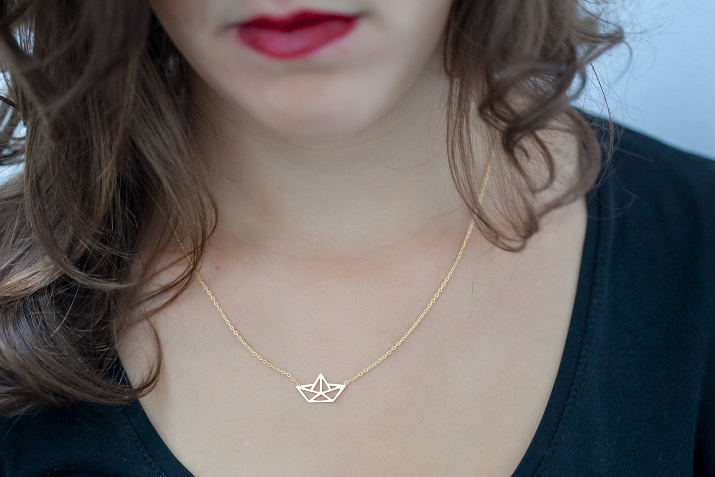 Kette mit Origami Papierschiff - 16 Karat vergoldet