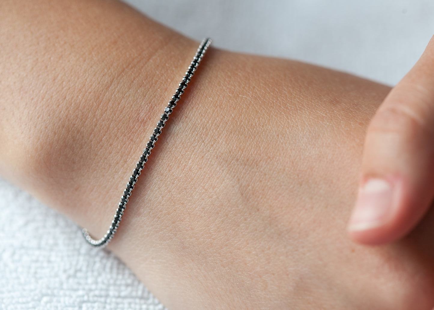 Tennisarmband schwarz aus Silber